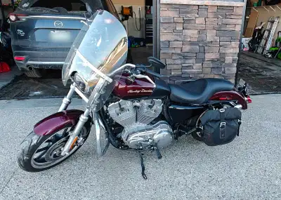 Selling my 2014 Harley Davidson Sportster 883. Good bike, pretty sure it's had 3 owners. Never been...