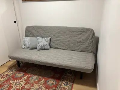 Perfect condition and barely sat on IKEA futon. Perfect for a student dorm as will make a nice bed....