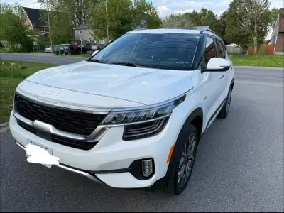 Selling my 2023 Kia Seltos SX Turbo AWD in stunning Snow White Pearl with a premium Burgundy Leather...