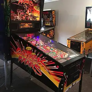 Looking to buy or possibly trade for an Original Attack From Mars or Elvira Scared Stiff PINBALL Mac...