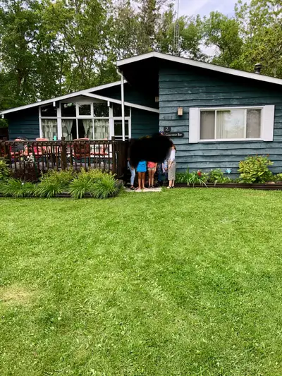 Don’t miss out on this rare opportunity to own a lake view cottage in Spruce Bay. Great views in thi...