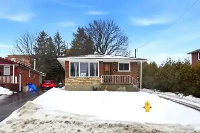 This detached bungalow sits on a premium 217 foot deep lot, offering a solid brick exterior and sign...