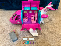 Barbie plane with accessories included and very good condition