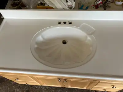 White countertop to fit a 48 inch vanity good condition. $20 for countertop. (does not come with the...