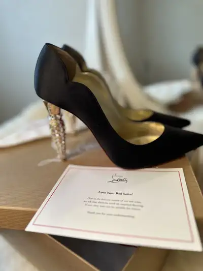 Gorgeous pumps with signs of wear. Otherwise amazing condition. One missing crystal. * **Brand:** Ch...