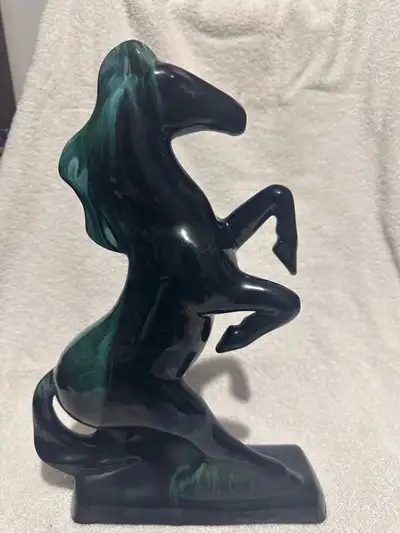 Vintage Blue Mountain Pottery horse stands 13.5 inches high. The felt bottom shows some wear, but ot...