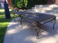 two wrought iron tables