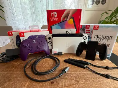 Nintendo Switch OLED plus accessories, View more