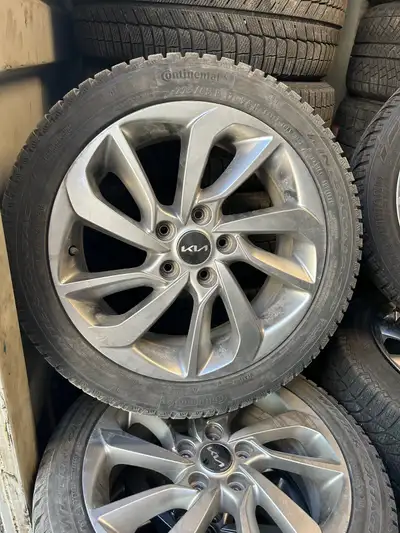 17” OEM Kia Forte rims with 225-45-17 continental winter contact tires. In excellent condition. Tire...