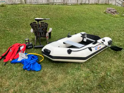 6ft Aqua Pack zodiac inflatable boat. Original price is $900. Comes with 2 brand new Mustang surviva...