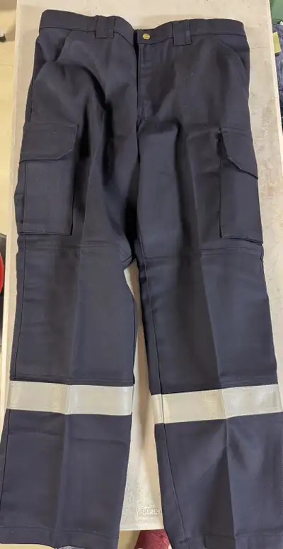 These NEW Millworks blue cargo workpants are size 38x32 and in good used condition. They are flame r...