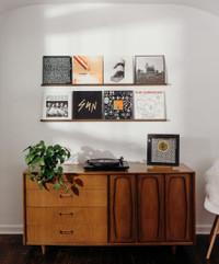Two vinyl record wall shelves