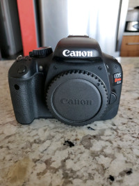 Canon EOS T2i Rebel w/ EFS 18-55 mm lens, case, 2 batteries