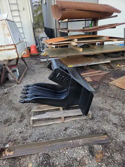 Extra heavy duty concrete slab removal bucket will work for a multitude of other applications as wel...