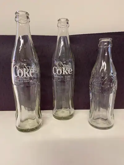 10 oz Vintage Coca-Cola Bottles Two have painted logo and one has embossed logo All three for $25 If...