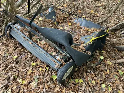 Old lawn sweeper. Needs TLC.