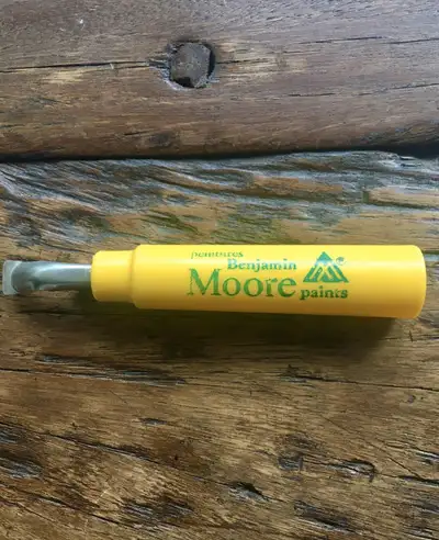 Vintage Benjamin Moore paint can opener. Excellent little display piece for man cave, garage or game...