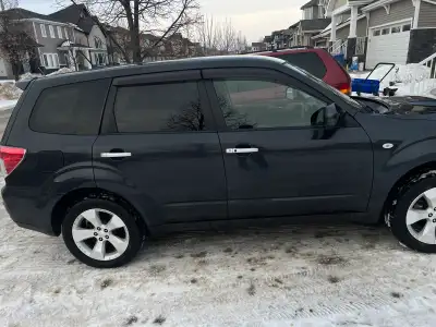 This pre-owned Subaru Forester XT is a capable and versatile SUV featuring reliable All-Wheel Drive...