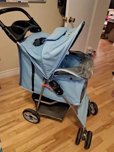 Cute pet stroller for sale. Good condition. Reason for selling...I am moving and downsizing.