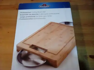 New Napoleon bamboo cutting board c/w 2 stainless steel bowls in, View more