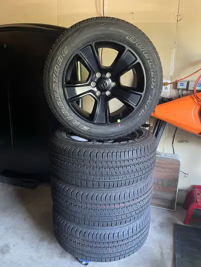 Never used take off Brand new condition 20x9 6x139.7 sports black wheels 275/55/20 Bridgetone dueler