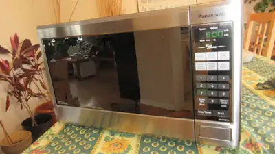 100% working Panasonic stainless microwave with automatic, sensor based, cooking modes inverter fine...