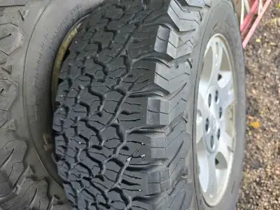 4 bf goodridge all terain 265r70 17 inch. 80% tread left come mounted and balanced on chev factory r...
