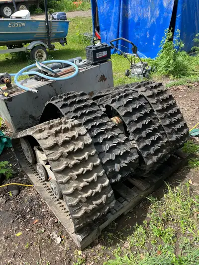 A set of used tracks still like new. Will fit Artic cat or Polaris with 4 1/2 inch spread in cross p...
