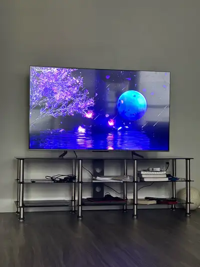TCL 55 inch Smart Tv with stand, View more