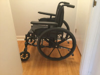 Folding Invacare MyOn Wheelchair with Footrests and Cushion