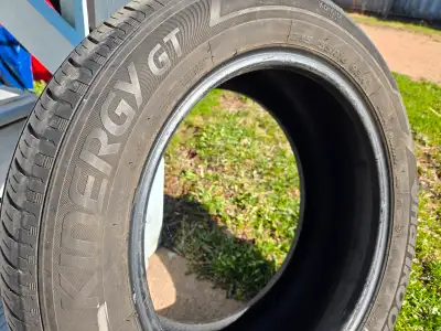Four (4) used All Season Tires Hankook Kinergy GT 215/55R16 They still have a bit of life in them