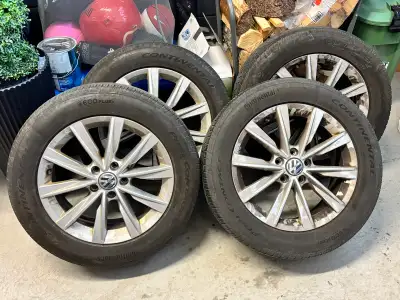 4 x Continental Pure Contact summer tires. 235/55 R17. Come on 17” VW rims (5x112). Fabric tire bags...