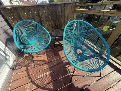 We bought these two Acapulco chair for the balcony, but a raccoon decided to use it to sharpen his t...