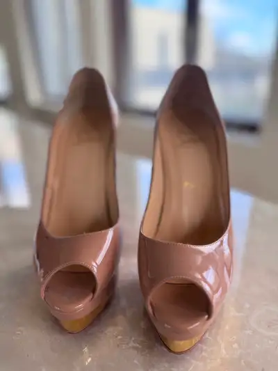Woman’s Louboutin  shoes, View more