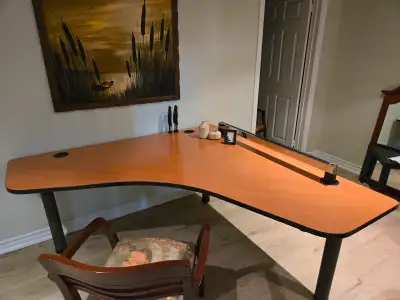 Transform your workspace with this L-Shaped Executive Desk; it seamlessly integrates into a wide ran...