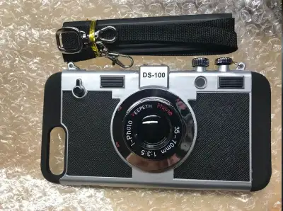 Brand new in original package. Iphone 7Plus/8plus case that looks like a vintage camera. Includes a...