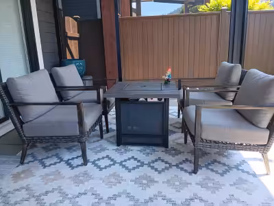 Beautiful like new patio furniture (four chairs) and fire table. All made by Canvas. Purchased from...