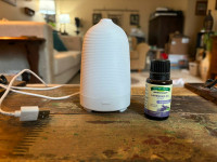 Mini essential oil diffuser with lavender essential oil