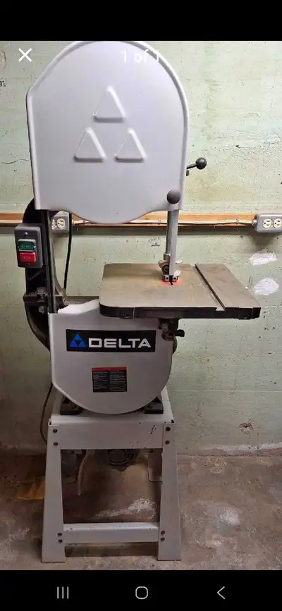 This is a used Delta bandsaw in good working condition, needs new rubber tires. OBO I can send more...