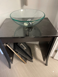 Free granite vanity and glass vessel sink 