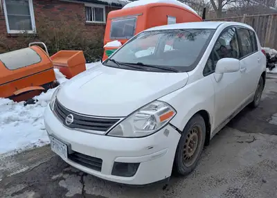 Nissan versa 2010 hatchback $1700 OBO AS is vehicle, will not safety in current condition Engine lig...