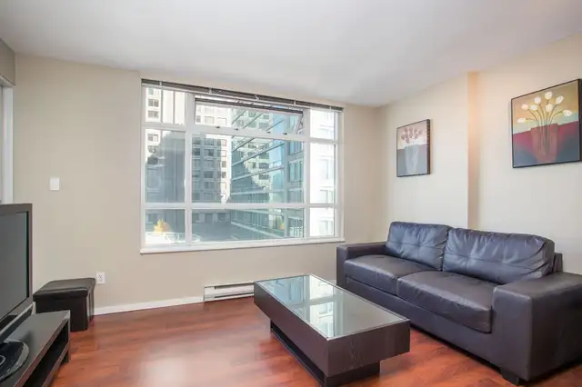 Fully Furnished 1BR + Den Condo