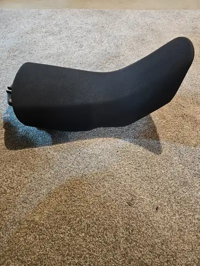 New, as in not used, Yamaha Tenere motorcycle seat. This came off of a new T7 and was not used. It's...