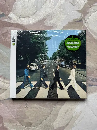 The Beattles Abbey Road unopened album for sale. Enhanced cd with mini documentary for pc or mac. Je...