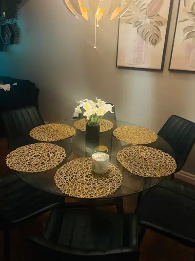 Selling a modern round glass dining table with 4 upholstered chairs, perfect for a condo, apartment,...
