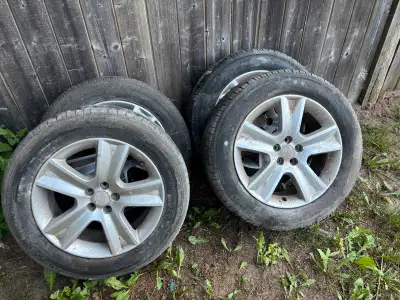 Selling a set of Subaru rims and tires. These are in used condition and have some wear, but are stil...