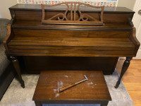 Piano and stool with storage