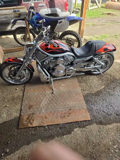 2003 harley vrod. Will trade for truck.13300miles . I put new faceplate in it so its in km/h but odo...