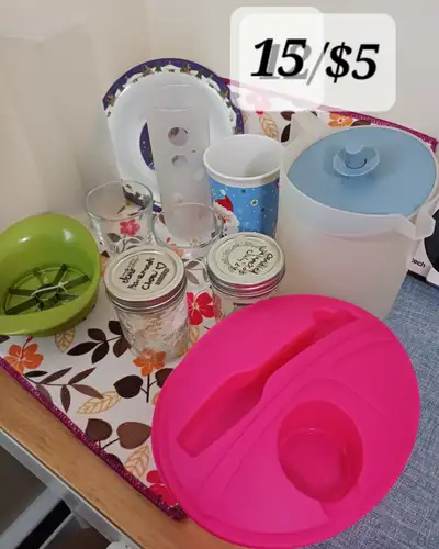 15/$5 Kitchen items - 1.  new apple corer 2.  tupperware pitch, View more