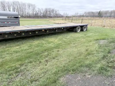 1989 transcraft. Step deck trailer. Safetied in October. Has hay stoppers for front and back. Also h...